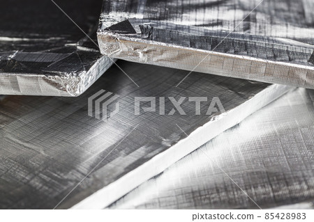foil-packed chocolate bar made of cocoa and sugar 85428983