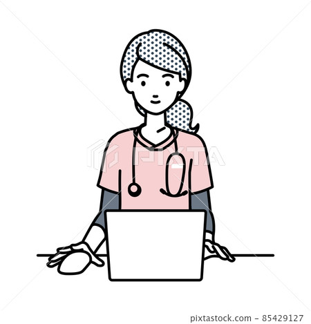 A nurse woman sitting at a desk and using a PC A nurse woman sitting at a desk and using a PC 85429127