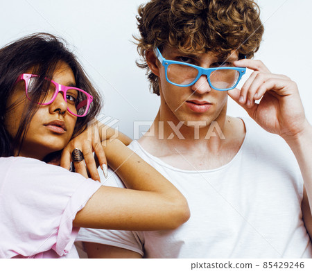 best friends teenage girl and boy together having fun, posing emotional on white background, couple happy smiling, lifestyle people concept, blond and brunette multi nations 85429246
