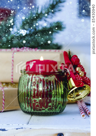 Christmas Decoration, candlestick, boxes on Wooden Background. 85430940