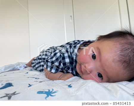 A lying baby A lying baby 85431413