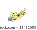 A tiger playing with a ball of yarn 85432059