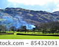 Countryside landscape with white smoke 85432091