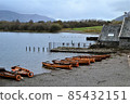 Wooden boats lined up on the shore 85432151