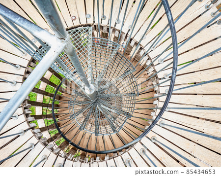 Acacia tower steel staircase in middle of tubus. Stairs construction in hellix shape Acacia tower steel staircase in middle of tubus. Stairs construction in hellix shape 85434653