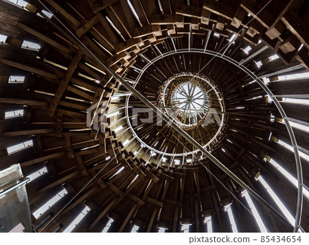 Acacia tower steel staircase in middle of tubus. Stairs construction in hellix shape Acacia tower steel staircase in middle of tubus. Stairs construction in hellix shape 85434654