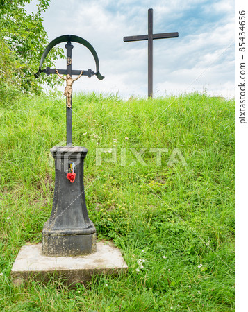 Wooden cross and a memorial at the site of the execution site Wooden cross and a memorial at the site of the execution site 85434656