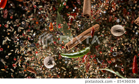 Freeze Motion Shot of Flying Mix Spices. Freeze Motion Shot of Flying Mix Spices. 85436036