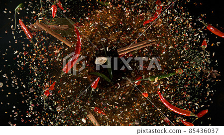 Freeze Motion Shot of Flying Mix Spices. Freeze Motion Shot of Flying Mix Spices. 85436037