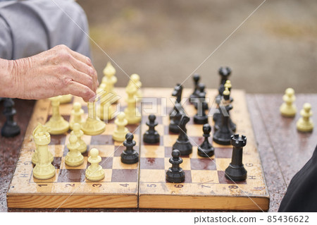 Two men are playing chess. Chess board game concept of business ideas and competition and strategic plan the meaning of success. High quality photo Two men are playing chess. Chess board game concept of business ideas and competition and strategic plan the meaning of success. High quality photo 85436622