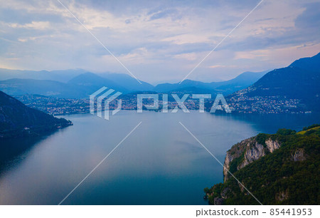 Aerial view over the Lake Lugano in Switzerland - evening view Aerial view over the Lake Lugano in Switzerland - evening view 85441953