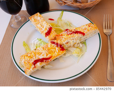 Pastel de verano - delicious summer cake with sliced bread, ham, cheese, surimi, mayonnaise Pastel de verano - delicious summer cake with sliced bread, ham, cheese, surimi, mayonnaise 85442970