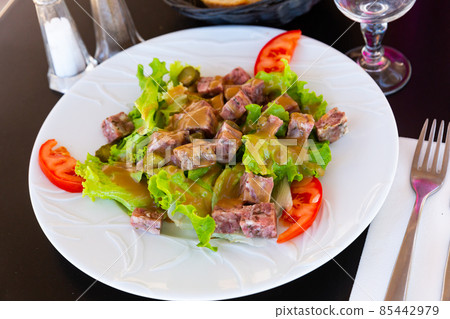 French salad with headcheese, pickles, greens, tomatoes French salad with headcheese, pickles, greens, tomatoes 85442979
