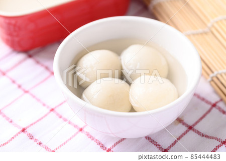 Tangyuan, Chinese dessert made of ball glutinous rice flour and filled with black sesame 85444483