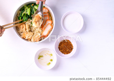 Noodles soup with wonton dumpling and grilled red pork, Asian food 85444492