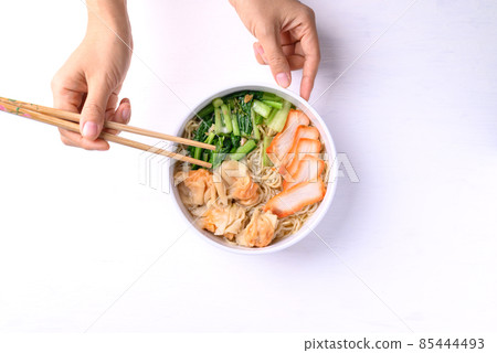 Noodles soup with wonton dumpling and grilled red pork, Asian food, Top view 85444493