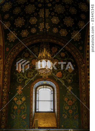 Antique chandelier on mosaic wall in Church of the Savior on Spilled Blood in St. Petersburg, Russia 85445348