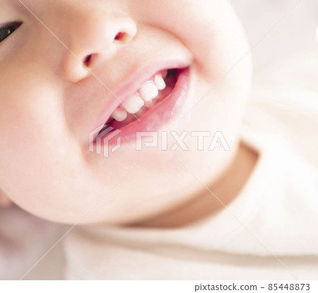 Image of baby's mouth up showing teeth and laughing Image of baby's mouth up showing teeth and laughing 85448873