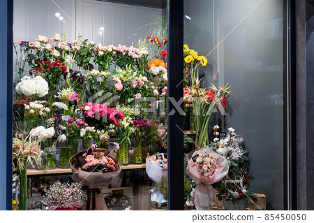 fridge in premium flower shop with bouquets and stylish flower arrangements fridge in premium flower shop with bouquets and stylish flower arrangements 85450050
