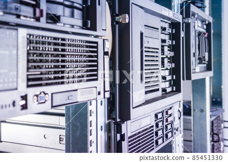 Cluster of data storage hard drives inside server room 85451330