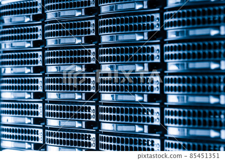Cluster of data storage hard drives inside server room Cluster of data storage hard drives inside server room 85451351