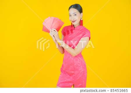 Portrait beautiful young asian woman with red envelope Portrait beautiful young asian woman with red envelope 85451665