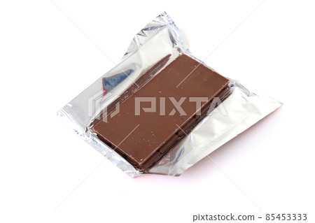 chocolate bar in foil on white isolated background 85453333