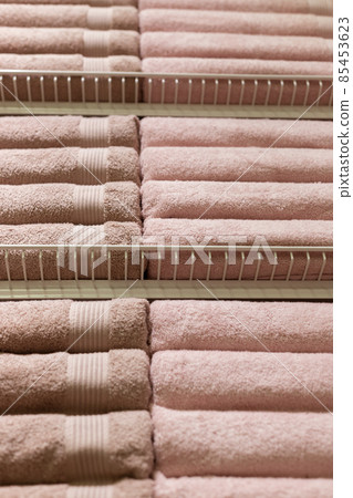Stack of fluffy towels in store. Background Stack of fluffy towels in store. Background 85453623