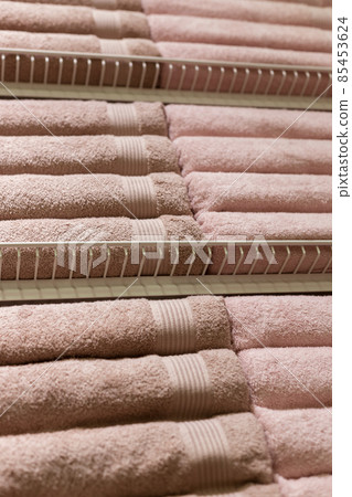 Stack of fluffy towels in store. Background 85453624