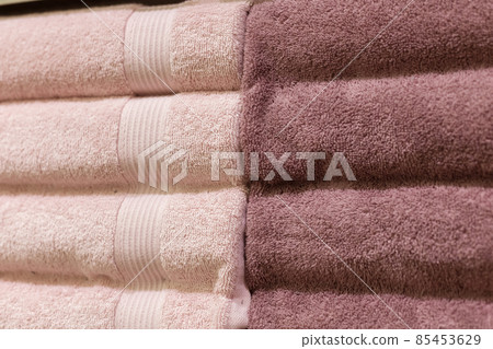 Stack of fluffy towels in store. Background Stack of fluffy towels in store. Background 85453629