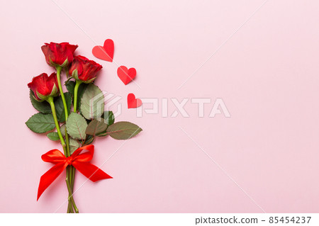 Valentine day composition with rose flower and red heart on table. Top view, flat lay, copy space Holiday concept Valentine day composition with rose flower and red heart on table. Top view, flat lay, copy space Holiday concept 85454237