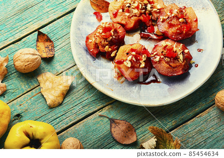 Sweet glazed quince dessert 85454634