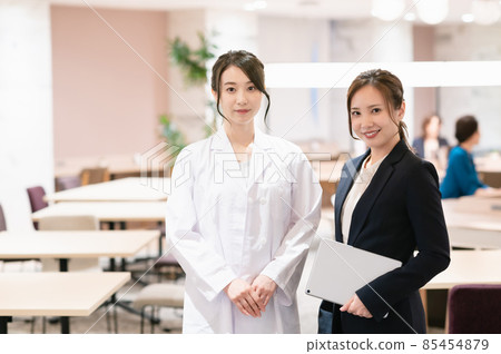 Female doctor and business woman Female doctor and business woman 85454879