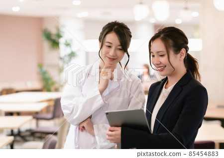 Female doctor and business woman Female doctor and business woman 85454883