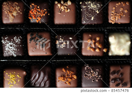 dark, milk and white belgium chocolate candies dark, milk and white belgium chocolate candies 85457476
