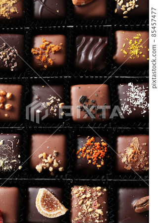 dark, milk and white belgium chocolate candies dark, milk and white belgium chocolate candies 85457477