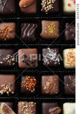 dark, milk and white belgium chocolate candies dark, milk and white belgium chocolate candies 85457478