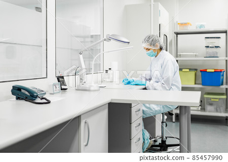 Laboratory for the production of biomaterials. People do research. 85457990