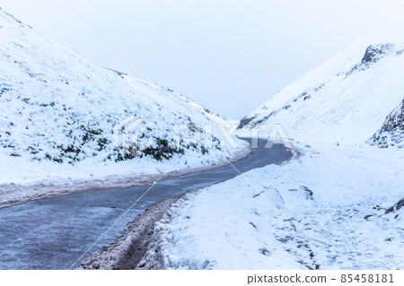 Winter view of snow covered Winnats Pass. Debyshire, UK. Winter view of snow covered Winnats Pass. Debyshire, UK. 85458181