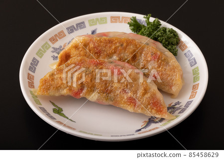 Red pickled gyoza dumplings Red pickled gyoza dumplings 85458629