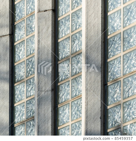 Jette, Brussels Capital Region - Belgium - 01 01 2022: Abstract view over concrete and patterned glass tiles of the college Saint Pierre Jette, Brussels Capital Region - Belgium - 01 01 2022: Abstract view over concrete and patterned glass tiles of the college Saint Pierre 85459357