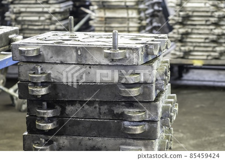 Large metal presses for the manufacture of various shapes of glass products are in stock in manufacture or factory. 85459424