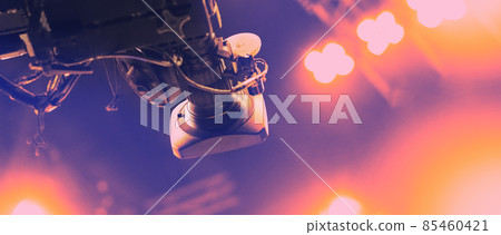 TV Camera broadcast on the crane tripod for shooting or recording and broadcasting content in studio production to on air tv or online internet live show. HD Video recording on crane. Selective focus. 85460421