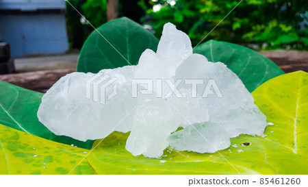 Alum cubes on green leaf. Alum is widely used in deodorant industry. Alum cubes on green leaf. Alum is widely used in deodorant industry. 85461260