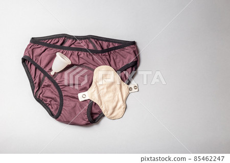 Reusable Women Menstrual Hygiene products on grey Reusable Women Menstrual Hygiene products on grey 85462247