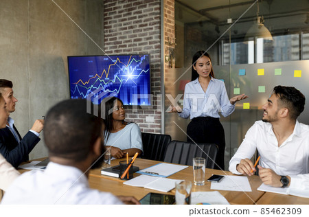 Multiethnic Group Of Business People Communicating During Corporate Meeting In Office Multiethnic Group Of Business People Communicating During Corporate Meeting In Office 85462309