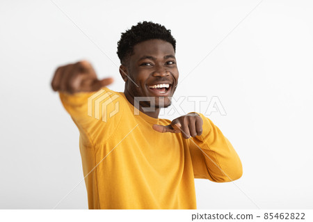 Funny african american guy gesturing on white background Funny african american guy gesturing on white background 85462822