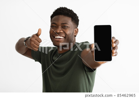 Cellphone with empty screen in black guy hand Cellphone with empty screen in black guy hand 85462965