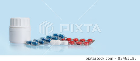Background of white tablets or pills on blue table. Medicine and pharmacy Background of white tablets or pills on blue table. Medicine and pharmacy 85463183