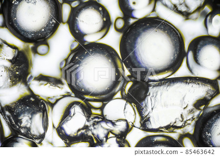 Silica gel for moisture control, absorbent particles under a light microscope, magnification 40 times 85463642